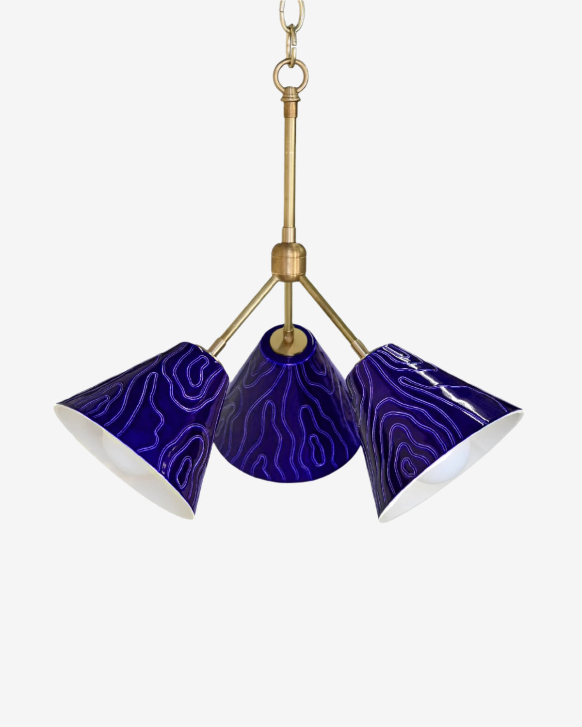 Faux Bois Detailing in Indigo with Hewn Brass